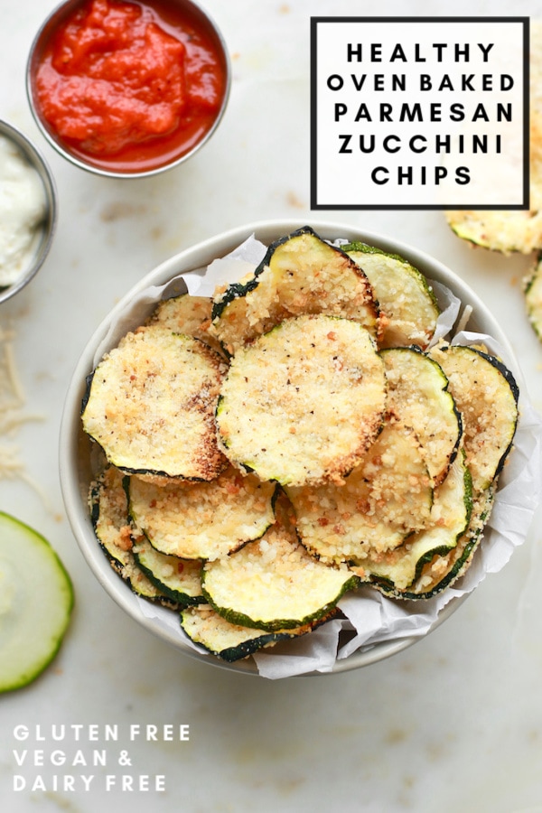 This healthy oven baked parmesan zucchini chip recipe is to die for! It's crispy, salty, and perfect for any chip craving. The dairy-free parmesan and gluten-free breading work wonderfully keeping these chips vegan and healthier than your regular run-of-the-mill fried chip! Perfect for those with food allergies too! 