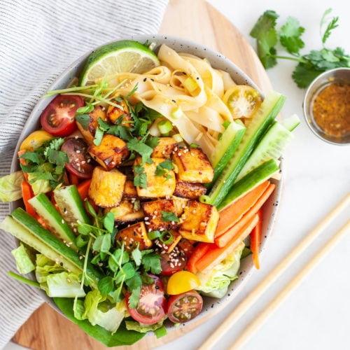 One of the best healthy Thai salad recipes you’ll try! With a delicious spicy lemongrass dressing (the tastiest of dressings!), rice noodles, crunchy cucumber, carrots, chopped cilantro, and crispy tofu (sub for chicken, beef, or shrimp if you don’t want vegan!). This salad is easy to make and perfect for any day of the week!