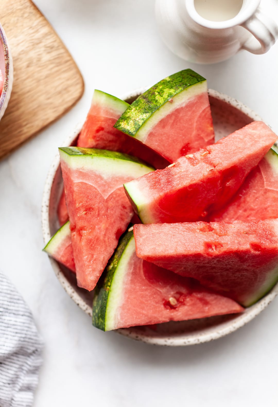 sliced watermelon triangles on a plate