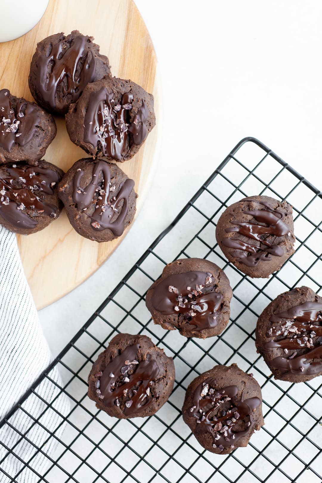 This easy and tasty recipe for healthy double chocolate cookies is super simple, dairy free, and has a gluten free option. Made with whole grains, cocoa powder, dark chocolate, and raw honey, they are a perfect sweet snack that’s soft, pillowy, chewy and low calorie. 
