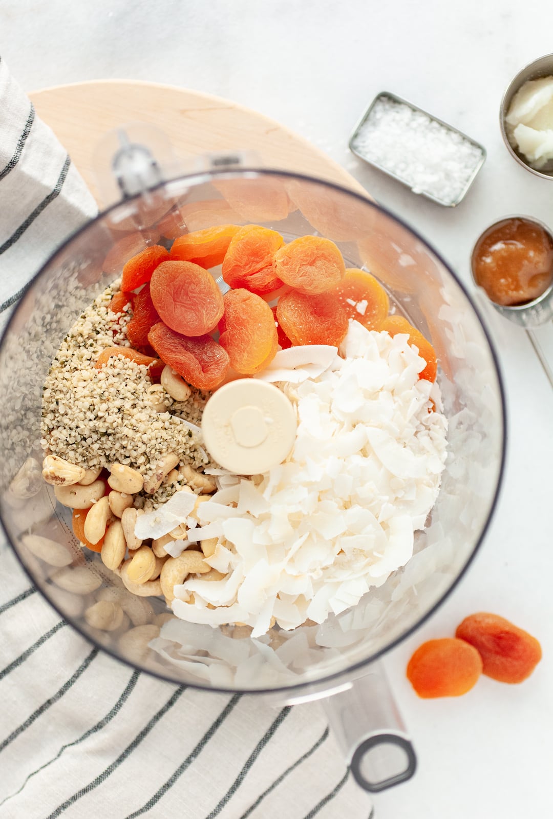 Ingredients for Apricot Cashew Energy Bars in a food processor