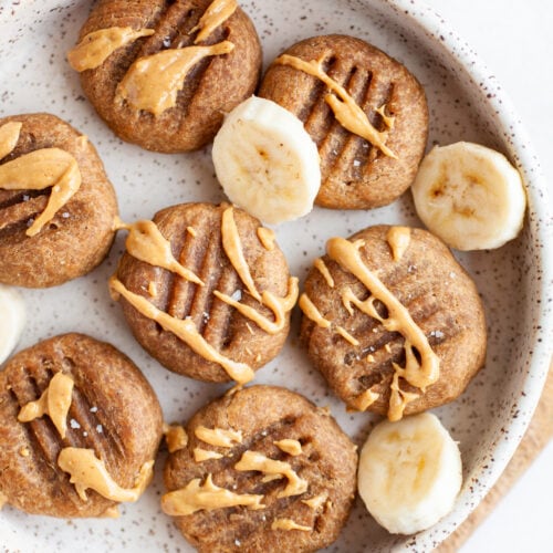 Healthy Peanut Butter Banana Cookies with a drizzle of peanut butter