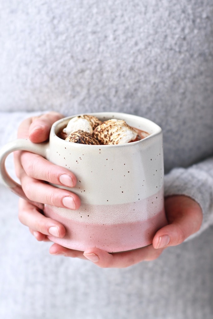 This delicious, homemade healthy hot chocolate recipe is perfect for the winter season. It's made with nourishing ingredients, fortified with iron, and naturally dairy free and paleo. It can easily be made vegan and is the best healthy version of hot cocoa you'll try! 