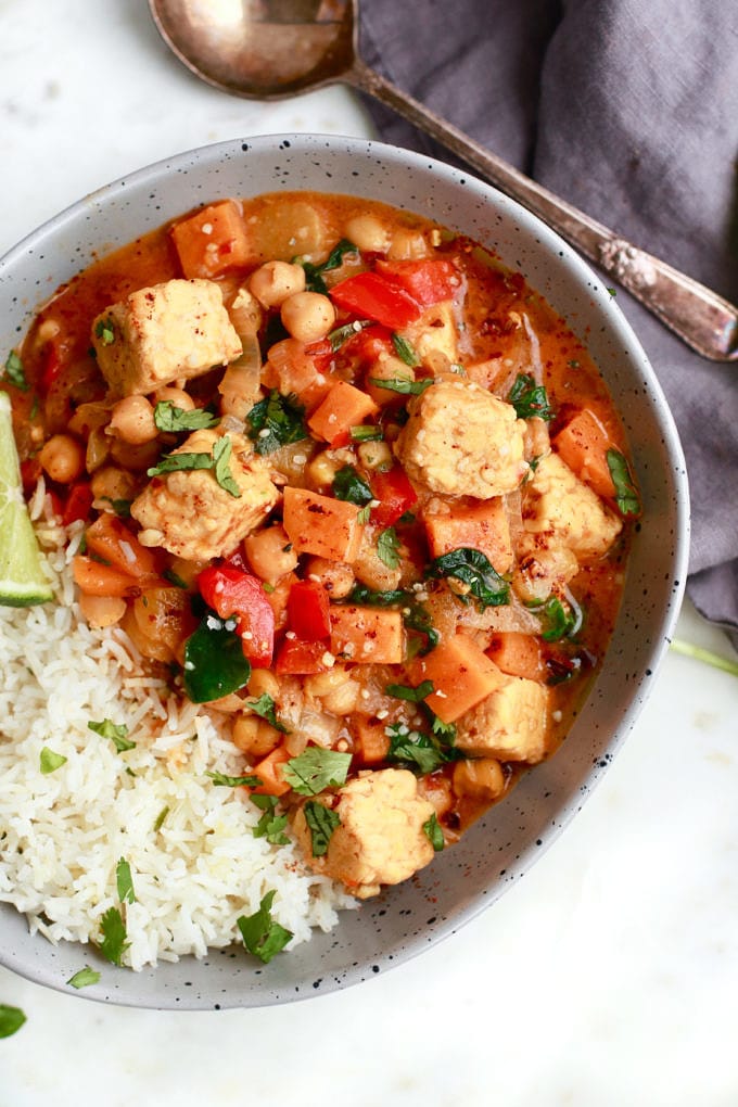 This delicious and easy recipe for Thai Red Curry stew is so perfect for any day of the week. It’s vegetarian, can be easily made vegan, full of vegetables and tempeh and made with coconut milk. It’s also gluten free, can be served with rice, quick and simple…less than 30-minutes to dinner! 