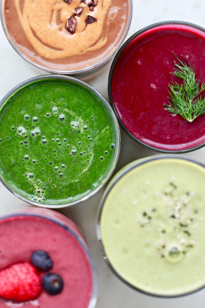 Colourful healthy smoothies in glasses