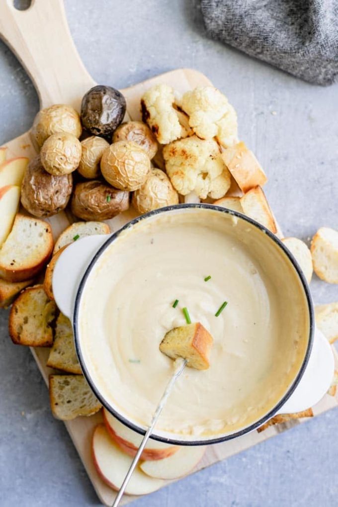 11 Delicious Dairy Free Cheese Recipes To Make | Vegan Cheese Fondue |Try these 11 delicious and easy dairy free cheese recipes that won’t make you miss the real thing! They are gluten free, made with all kinds of great dairy free ingredients like cashews and coconut milk! Whether you are craving nacho cheese sauce, fondue, a cheese ball, cream cheese, queso, mozzarella, or jalapeño cheese, there’s a vegan option for every one - comfort food at it’s finest! 