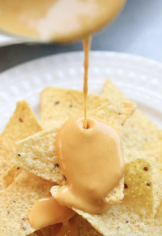 11 Delicious Dairy Free Cheese Recipes To Make | Vegan Nacho Cheese Sauce | Try these 11 delicious and easy dairy free cheese recipes that won’t make you miss the real thing! They are gluten free, made with all kinds of great dairy free ingredients like cashews and coconut milk! Whether you are craving nacho cheese sauce, fondue, a cheese ball, cream cheese, queso, mozzarella, or jalapeño cheese, there’s a vegan option for every one - comfort food at it’s finest! 