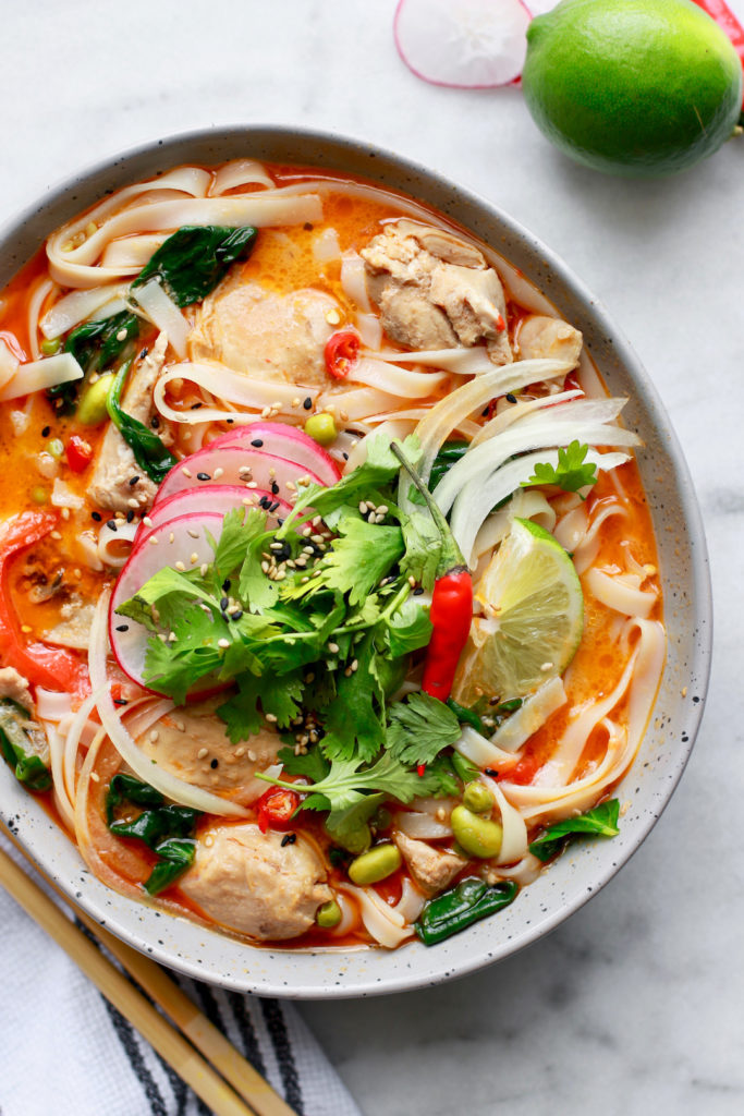 This delicious and easy Thai chicken soup recipe with coconut and rice noodles is healthy, slightly spicy, dairy free, and gluten free made in just 15-minutes in the crockpot express crock pressure cooker (it’s a slow cooker too!). Full of spring vegetables and super nourishing, enjoy this soup even as the weather gets warmer!