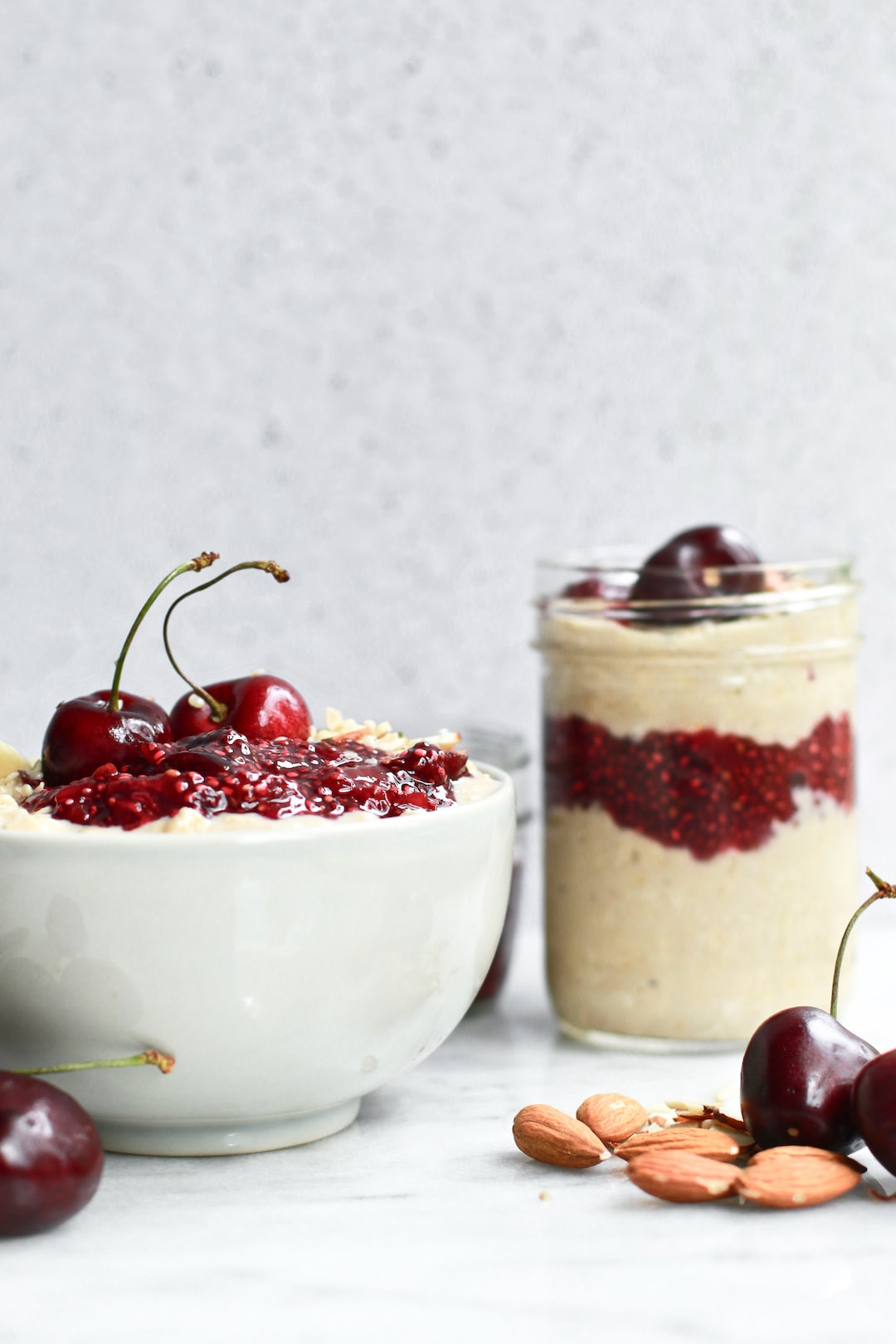 This Healthy Overnight Oats with Cherry Chia Seed Jam recipe is a must try for fast and rushed mornings. If you love dairy free overnight oats and cherries this is a simple vegan breakfast packed with protein and suitable for clean eating that you’ll absolutely love! Use gluten free rolled oats to keep this breakfast gluten free friendly and switch up the cherries for other berries like blueberry and raspberry at other times of year when cherries aren’t in season!
