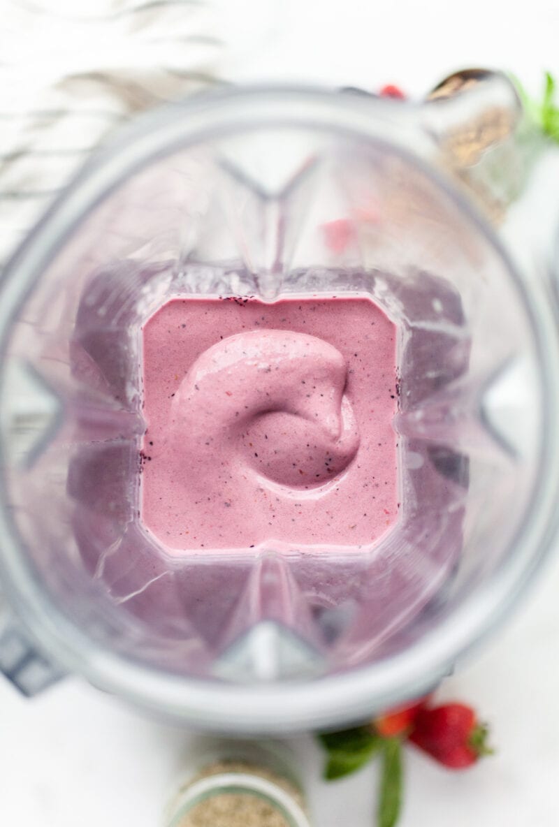 berry smoothie in a blender canister