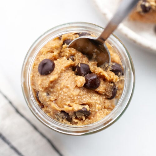 Vegan cookie dough in a jar with a spoon
