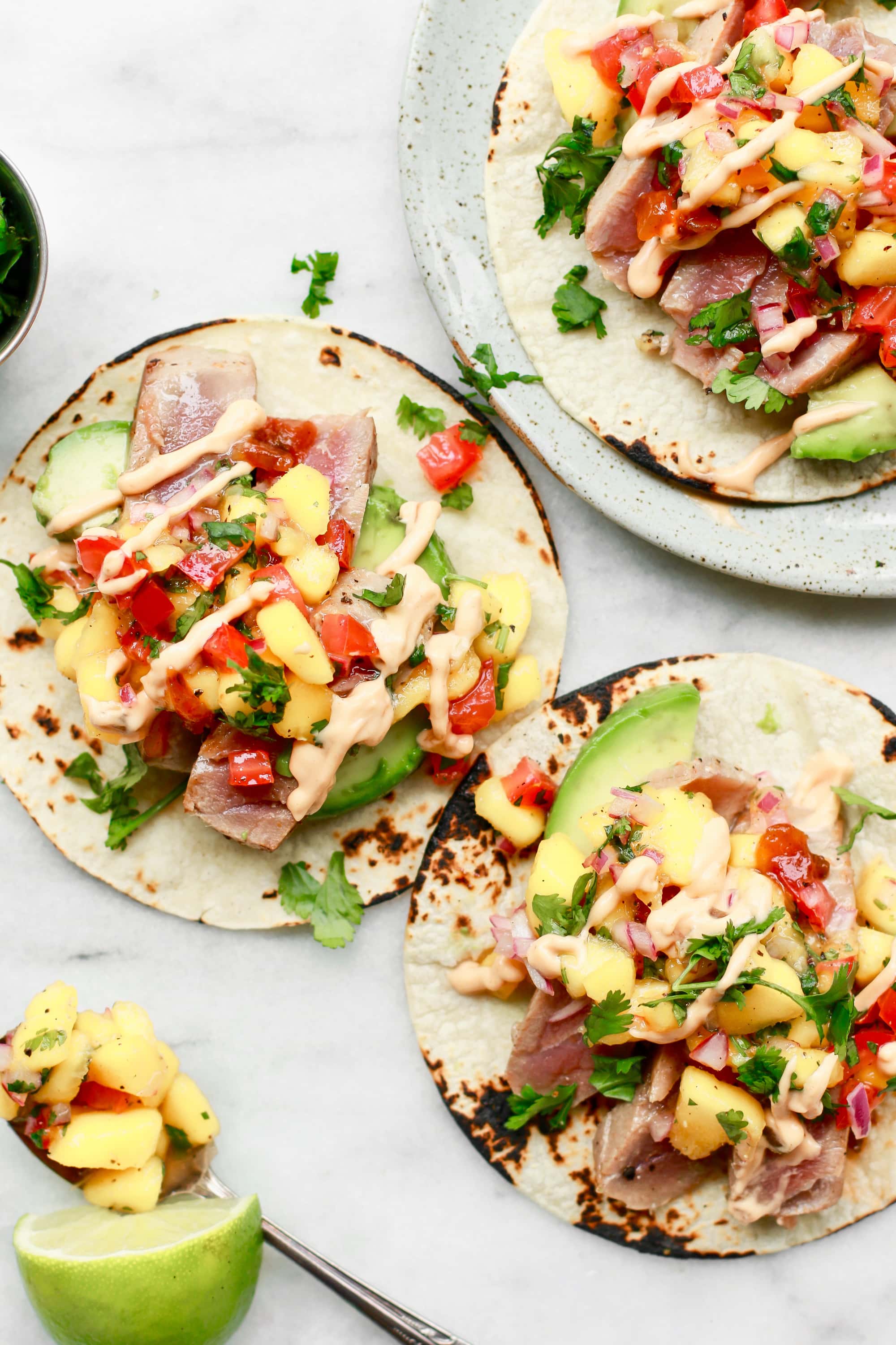 ahi fish tacos with mango salsa on toasted tortillas