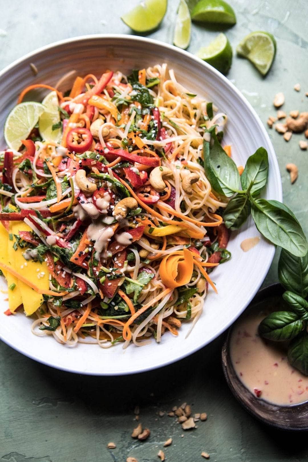 rainbow vegetable and noodle salad in a large bowl