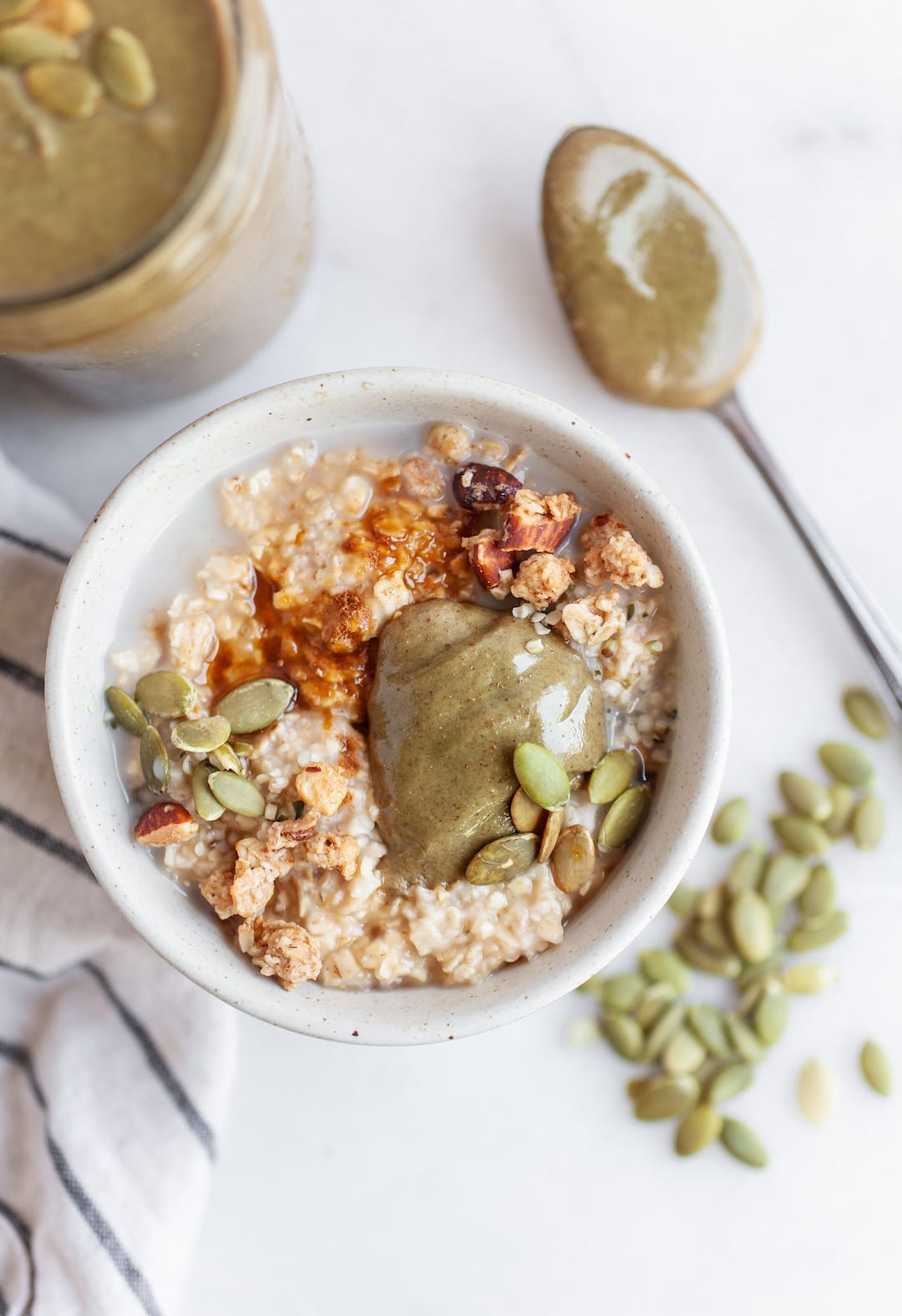 bowl of oatmeal with homemade pumpkin seed butter