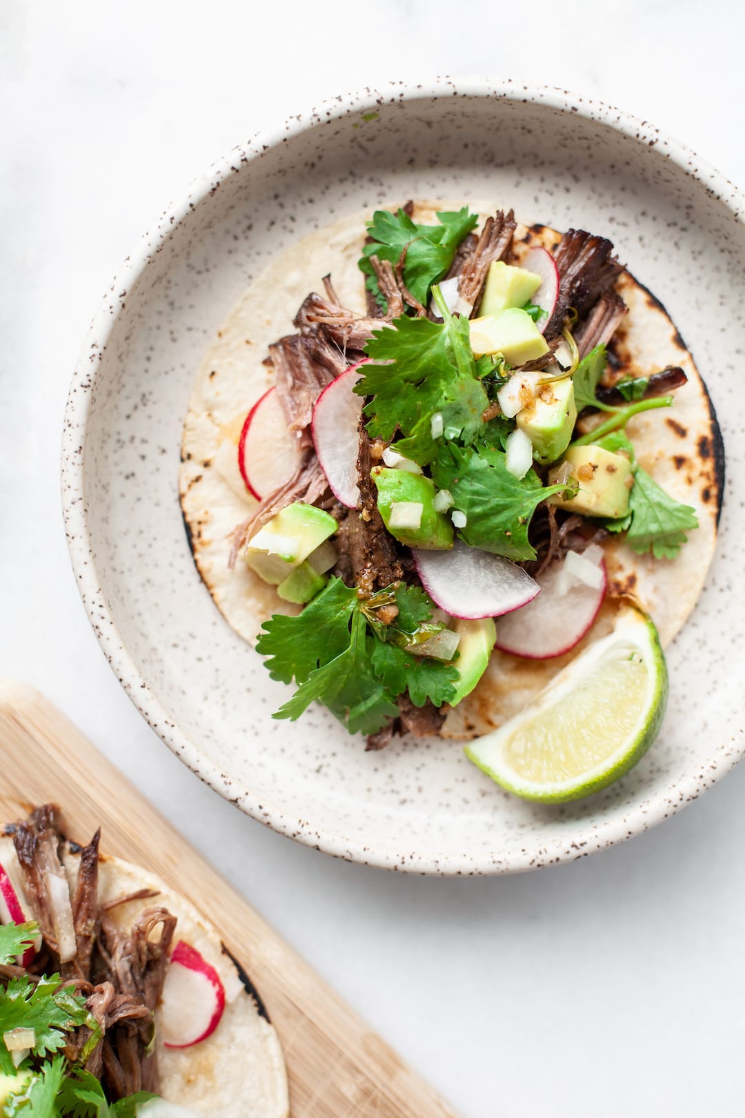 Image of carne asada tacos with cilantro and lime