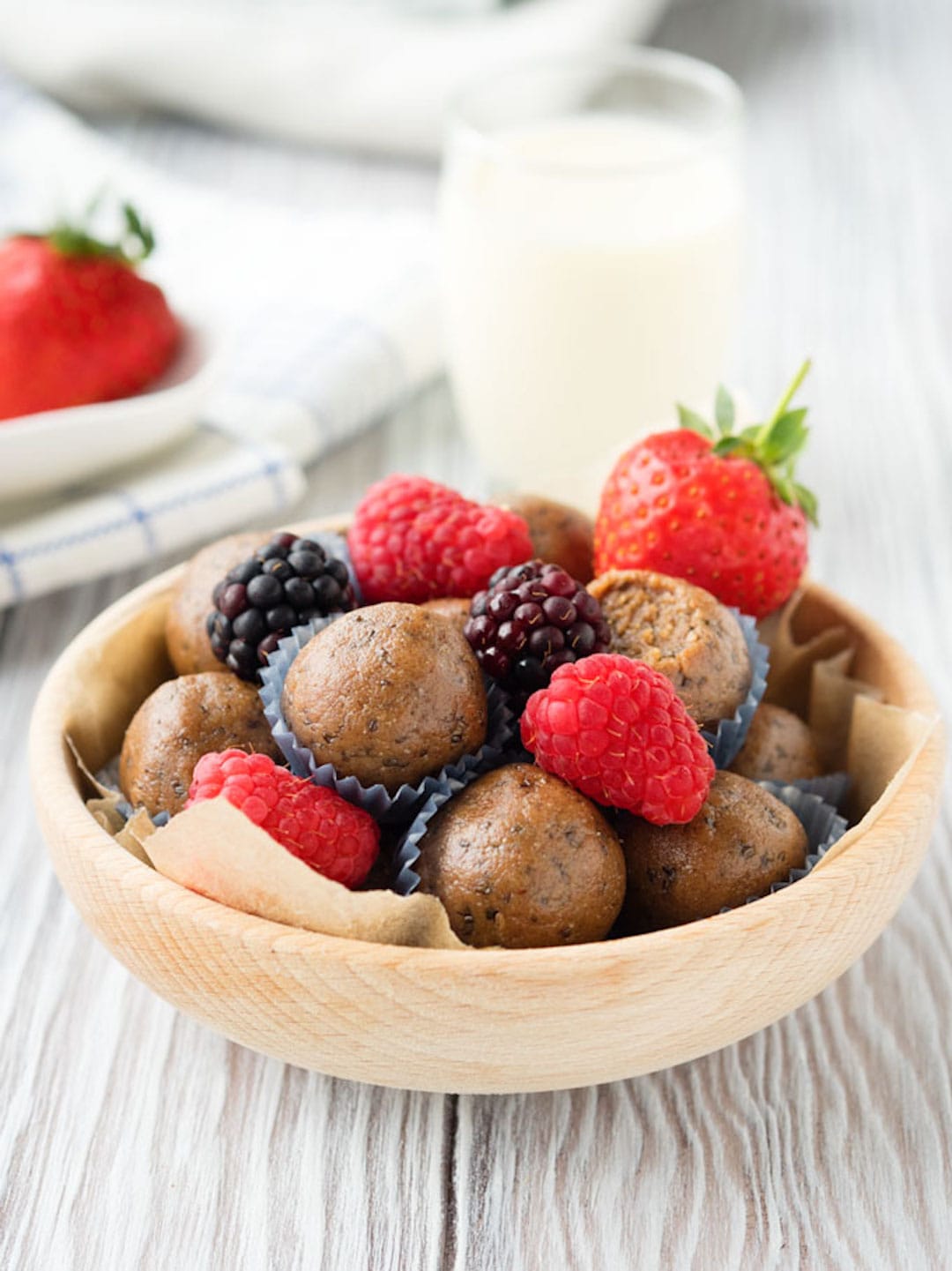 protein ball in a bowl with berries