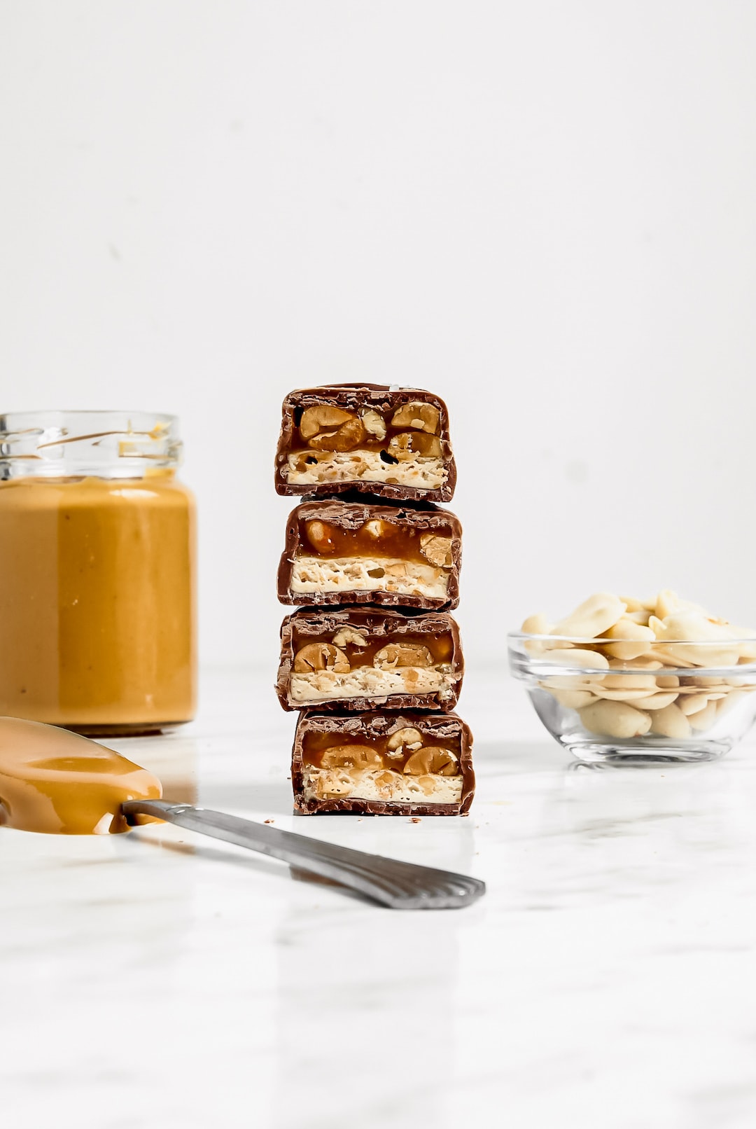 Stack of Must-Make Healthy 'Snickers' Protein Bar with peanut butter