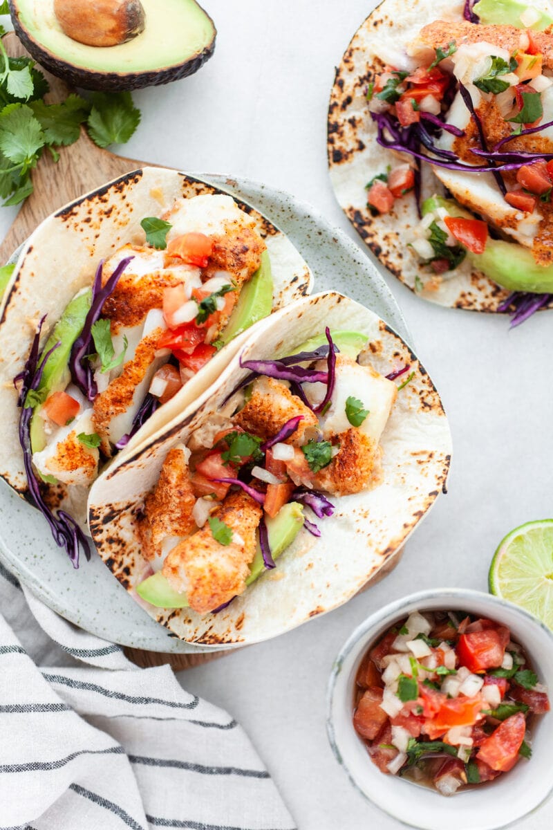 Healthy Air Fryer Fish Tacos with fresh salsa and cabbage
