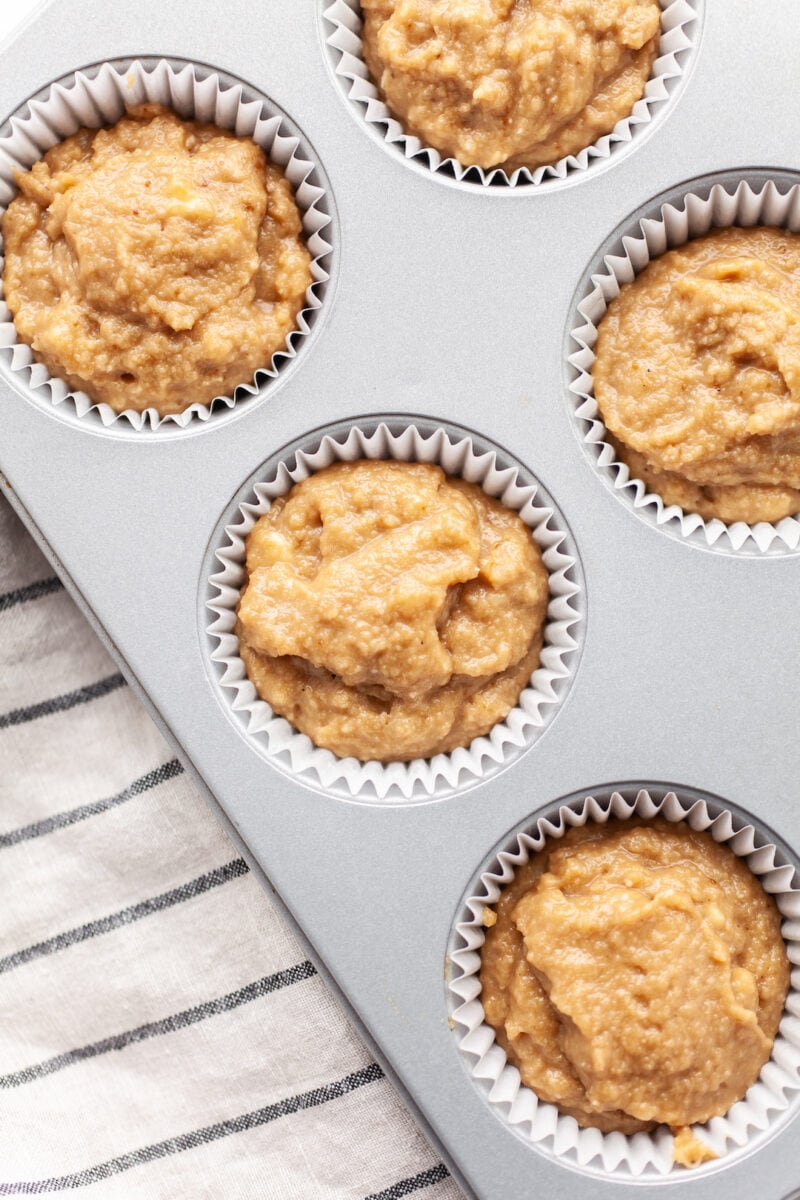 Easy Almond Flour Banana Muffins batter in a muffin tin