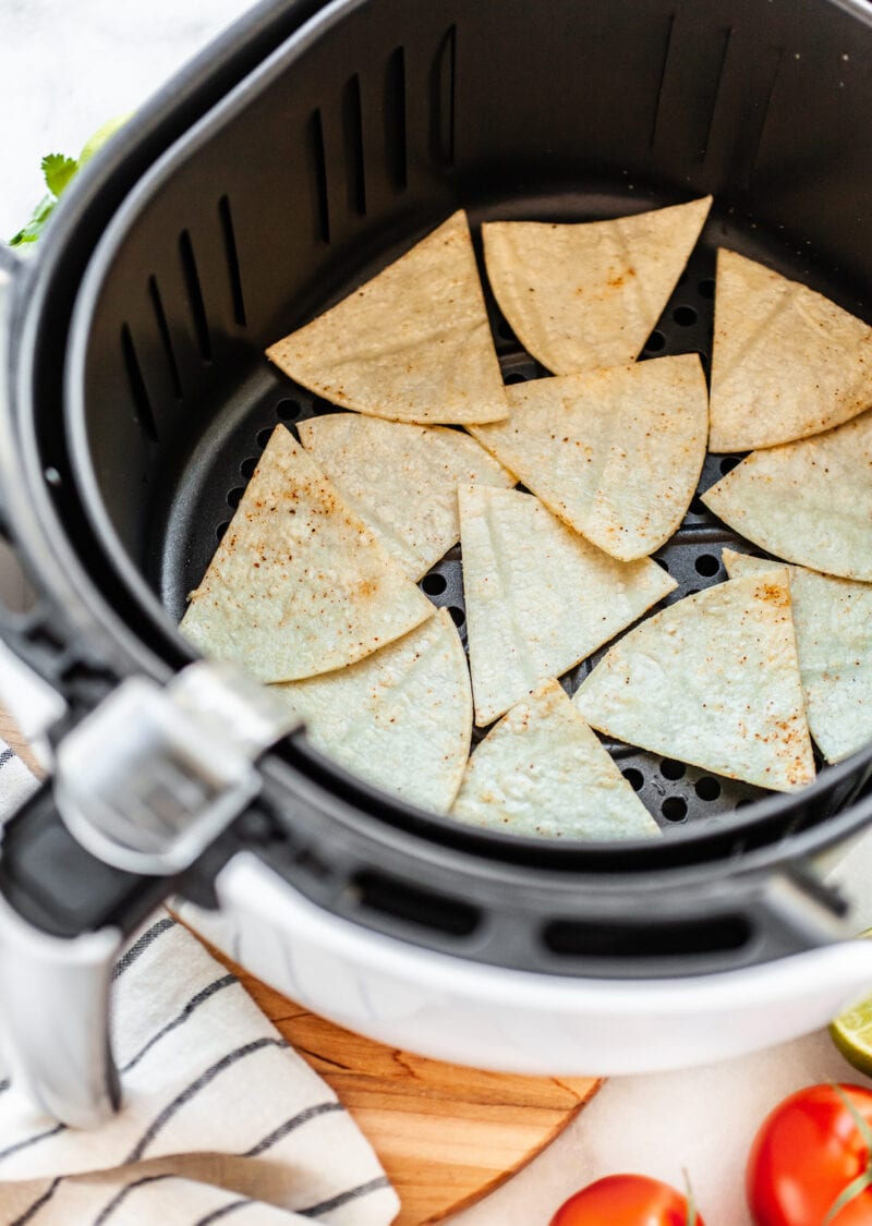 uncooked tortilla chips in the air fryer