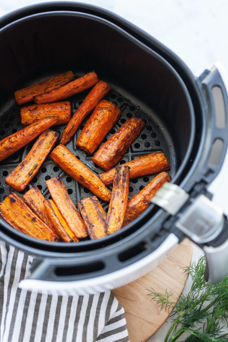 Incredible Air Fryer Carrots in the air fryer basket