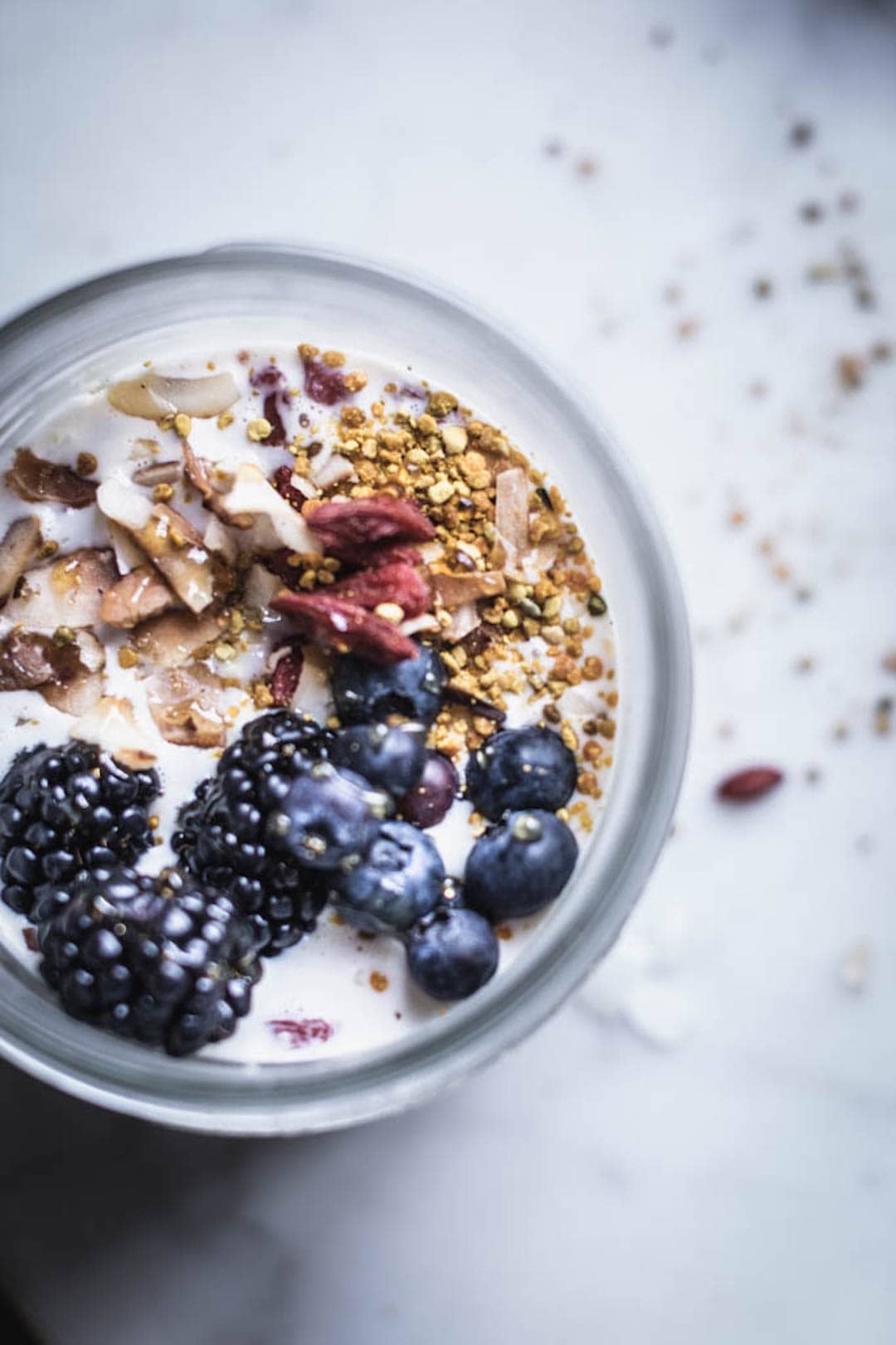 Overnight oats topped with berries and bee pollen