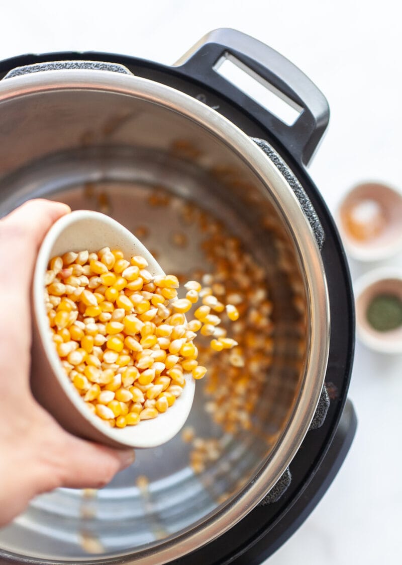 Pouring popcorn kernels into an instant pot