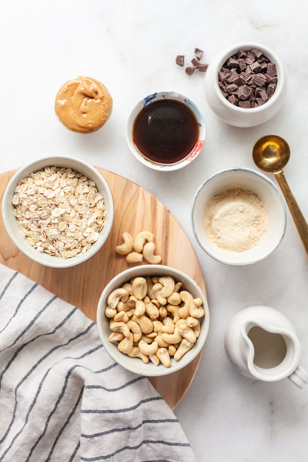 overhead view of ingredients for protein cookie dough in bowls