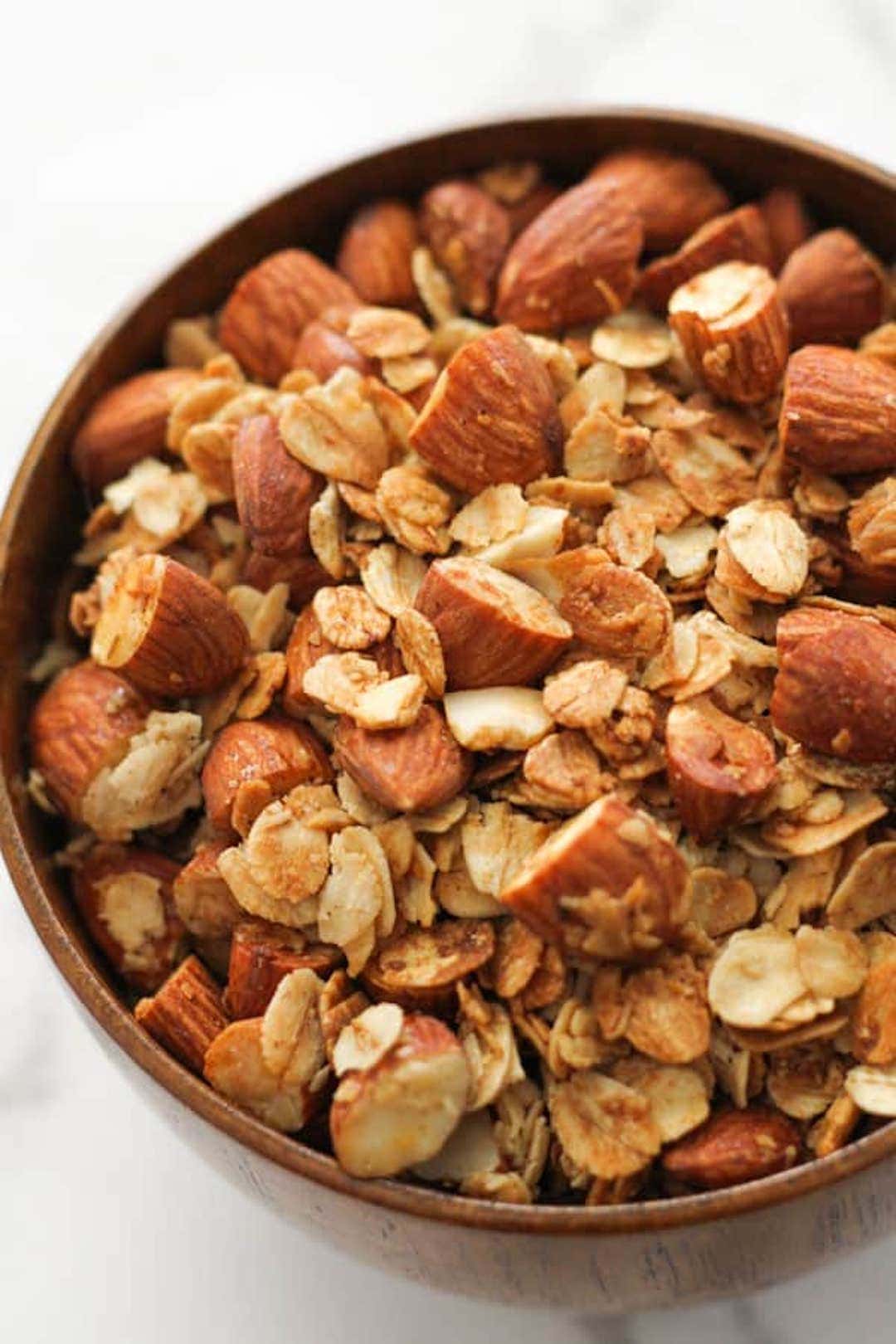 image of air fryer granola in a bowl with almonds